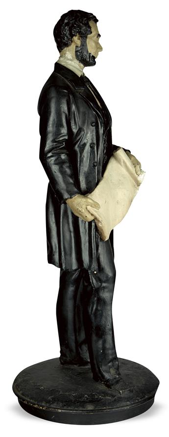 (LINCOLN, ABRAHAM.) Full-figure statuette of Lincoln holding the Emancipation Proclamation, after Volk.